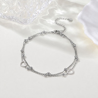 Chaîne de cheville tendance à double rang avec perles cœur ajourées, plaqué or 18K PVD, couleur argent, pour anniversaire