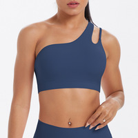 Sujetador deportivo de moda irregular sin aros con una sola tira, de tela suave con patchwork y espalda recortada, para fitness y entrenamiento.
