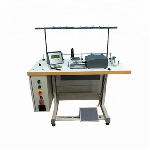 Automatic pom pom sewing machine