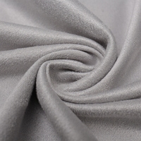 L'usine peut personnaliser le tissu en daim micro-élastique respirant à une seule face, adapté aux vêtements de jouets.