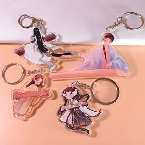 HanXin breloques en acrylique scintillant imprimées personnalisées et promotionnelles, figurine de dessin animé transparente imprimée en UV, porte-clés de dessin animé mignon