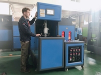 Machine de soufflage semi-automatique 5L à changement rapide de moule pour la fabrication de bouteilles en petites séries