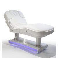 Table de massage électrique réglable de style moderne à 4 moteurs pour salons de beauté, avec grand espace de rangement, en cuir synthétique