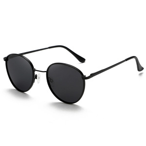 Nouvelles lunettes de soleil pour hommes de style européen et américain, monture ronde en métal, verres polarisés TAC UV400, couleur noire, design punk pour le cyclisme - Product Image 1