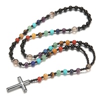 Collier en acier inoxydable noir givré avec perles et pendentif croix en pierre volcanique œil de tigre jaune, style sportif