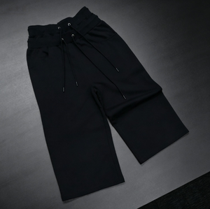 Shorts amples noirs pour hommes, longueur genou, avec double cordon de serrage, coupe ample, personnalisables, vente en gros - Product Image 6