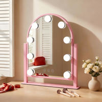Miroir de maquillage sur pied personnalisable à écran tactile, design arqué, cadre métallique, avec 9 ampoules LED réglables