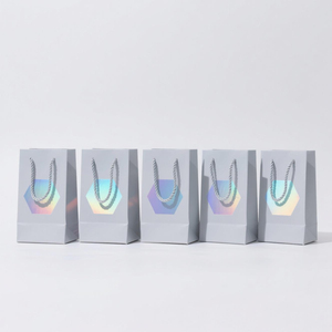 <span class=keywords><strong>Sac</strong></span> cadeau de luxe en papier blanc personnalisé avec logo - Design hexagonal doré holographique - Recyclable - Vente en gros - Product Image 2