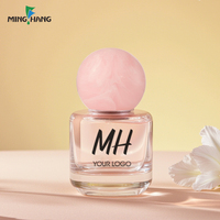 Flacon de parfum rond en verre de 30 ml, teinte rose douce, avec bouchon sphérique, pour la beauté et les parfums