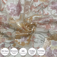 Vente en gros de broderie de luxe de haute qualité 100% polyester rose floral marque filet à broder perlé tissu à paillettes pour robe