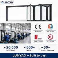 Fenêtre accordéon pliante anti-vent résistante aux ouragans de l'usine JUNYAO, PA66 5+20A+5, économie d'énergie, NFRC, pour projets événementiels
