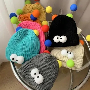 Wholesale cartoon big eyes little monster knitted hat with spring ball winter cute quirky skully beanie winter hat