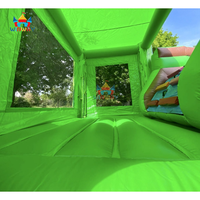 Château gonflable personnalisé sur le thème des dinosaures avec toboggan aquatique pour la location