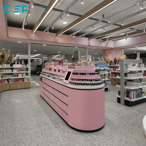 เคาน์เตอร์แสดงเครื่องสำอางแบบติดตั้งบนเกาะ ทำจากไม้เคลือบสีเงาด้วยเทคนิคอบสี พร้อมไฟ LED สำหรับร้านเครื่องสำอาง ผลิตโดยโรงงาน DSP เวียดนาม - Product Image 3