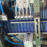 Machine de fabrication, de remplissage et de scellage automatique d'ampoules en plastique