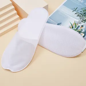 Chinelo descartável de tecido não tecido premium personalizado preço barato para hóspedes do hotel SPA chinelos não tecidos