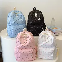 Sac à dos pour ordinateur portable tendance et mignon avec imprimé nœud, fermeture éclair, bretelles réglables, protection pour ordinateur portable, idéal pour la rentrée scolaire