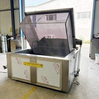 Marmite de cuisson vapeur alvéolée avec panier basculant hydraulique et décharge automatique pour la préparation de viandes (bœuf, porc, canard, poulet) et aliments marinés