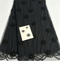 Tissu TC noir A087 avec motif floral en spirale noir-doré pour robes de soirée et robes