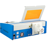Petit graveur laser CO2 de précision pour le marquage des métaux, la gravure de lettres sur le bois, la découpe du bois massif, du papier et des matériaux en caoutchouc
