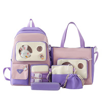 Tas Ransel Kanvas Grosir Desain Baru Wanita Kapasitas Besar 5-in-1 Set Siswi Lucu Boneka Plush Tas Ransel Dompet