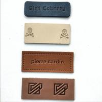 Etiquette personnalisée en cuir noir/marron véritable/gaufré Etiquettes en cuir gaufré avec logo en métal