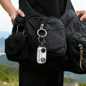 Brújula de Supervivencia de Bolsillo, Mini Brújula Multifunción para Llavero, Termómetro, Herramienta de Guía para Escalada y Supervivencia al Aire Libre - Product Image 1