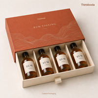 Coffret cadeau de dégustation de rhum personnalisé, quatre mini-bouteilles, emballage tiroir avec séparateurs en carton, ruban de tirage pour échantillonnage de marque