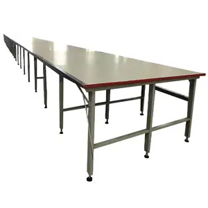 Table de découpe en tissu et planche de table de pavé usine de vêtements établi de machine à rainurer en tissu automatique