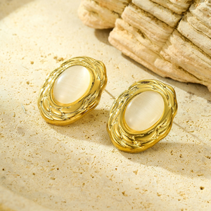 Ensemble minimaliste européen et américain de boucles d'oreilles et de bagues en titane avec pierres œil-de-chat, au design tendance et original. - Product Image 3