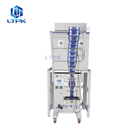 Machine à emballer automatique de taille de rouleau de sachet de granule de poudre de grain de haricots de casse-croûte 26cm avec doseur de remplissage de 4 balances