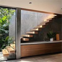 Escalier flottant moderne en bois éclairé par LED avec panneaux en métal durable et en verre trempé Design minimaliste et intelligent pour hôtels