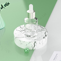 Bouteille à pompe en plastique ambré givré de luxe personnalisée bouteilles de sérum de 45ml bouteille en plastique PET à paroi épaisse