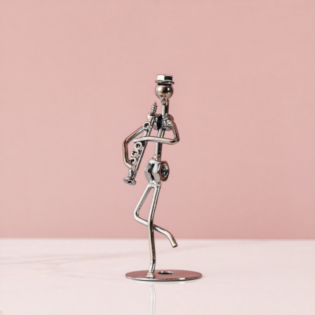Reed pipe-iron art figurine