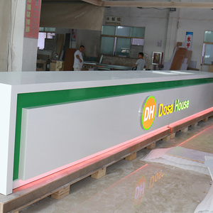 Longue table de banque avant en marbre en forme de L de luxe simple vert Comptoir de restaurant Bureau de réception tufté - Product Image 1