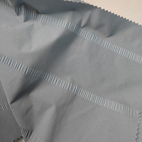 Tissu pongé extensible à trame, matériau anti-déchirure pour le rembourrage et la doublure des doudounes