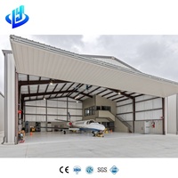 Hangar industrial para aviones Almacén con marco de acero con taller de mantenimiento Panel sándwich hecho
