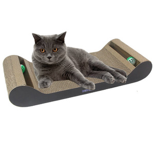 Rascador para gatos con ranuras para bolas, papel corrugado grueso de 60x25.5x9.5cm para afilar garras y jugar - Product Image 1