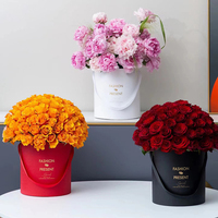 Boîte cadeau personnalisée pour chapeau avec ruban et poignée, design floral cylindrique, impression gaufrée, laminage mat, matériaux recyclés, emballage cadeau