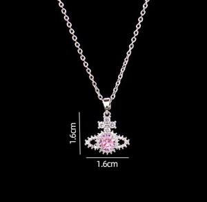 Nouveau collier pendentif en zircon étoile Saturne tendance pour femmes et hommes en acier titane avec chaîne plaquée or - Product Image 5