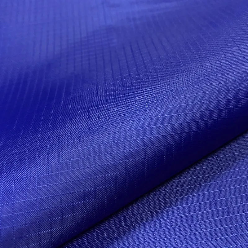 Tessuto in nylon trasparente ripstop in nylon ultraleggero impermeabile 10d 15d 20d con finitura a prova di piuma per giacca