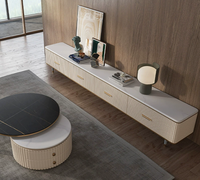 Table basse et meuble TV modernes de luxe avec plateau en marbre et rangement en acier inoxydable pour salon et chambre