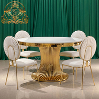 Tables et chaises de mariage modernes et durables en acier inoxydable avec plateau en verre pour l'ameublement d'hôtels, les banquets et les réceptions