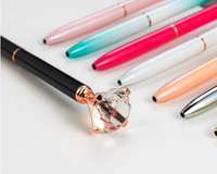 Maßgefertigte Orange-Gold Feder Neuartige Werbe-Kugelschreiber Marken-Luxus-Kristall Schwarz-Gold 1,0mm Metall-Stifte