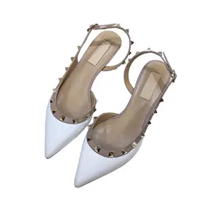 High quality baotou sandals women's summer new flat flat pointed rivets fairy wind with skirt fashion all matching single shoes