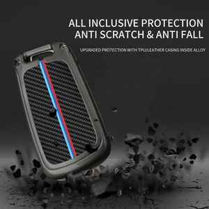 <span class=keywords><strong>Coque</strong></span> de <span class=keywords><strong>clé</strong></span> de voiture en métal et fibre de <span class=keywords><strong>carbone</strong></span> personnalisable en gros avec logo de voiture, nouveau design - Product Image 3