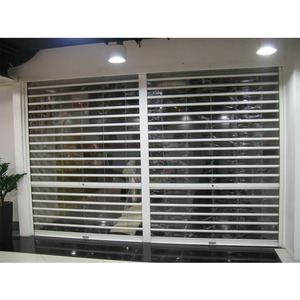 Portes de garage automatiques à enroulement rapide en acier inoxydable transparent en plastique innovant à enroulement interne - Product Image 1