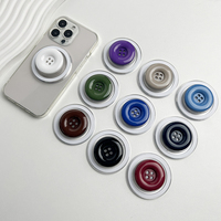 Support de téléphone magnétique à bouton de couleur bonbon poignée de téléphone magnétique de bureau paresseux rétractable poignée de support de prise de téléphone personnalisée