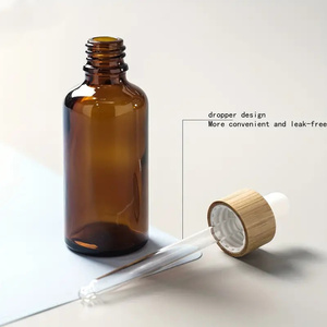 Bouteille compte-gouttes cylindrique en verre multi-capacités pour huiles essentielles et sérums de soin, avec bouchon sérigraphié, emballage carton, marque Capot - Product Image 6