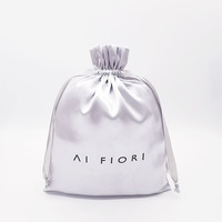 Perruques en soie de luxe personnalisées sacs à poussière d'emballage sac cadeau de qualité avec cordon pour bijoux cosmétiques lingerie sacs à main pochette en satin pour cheveux